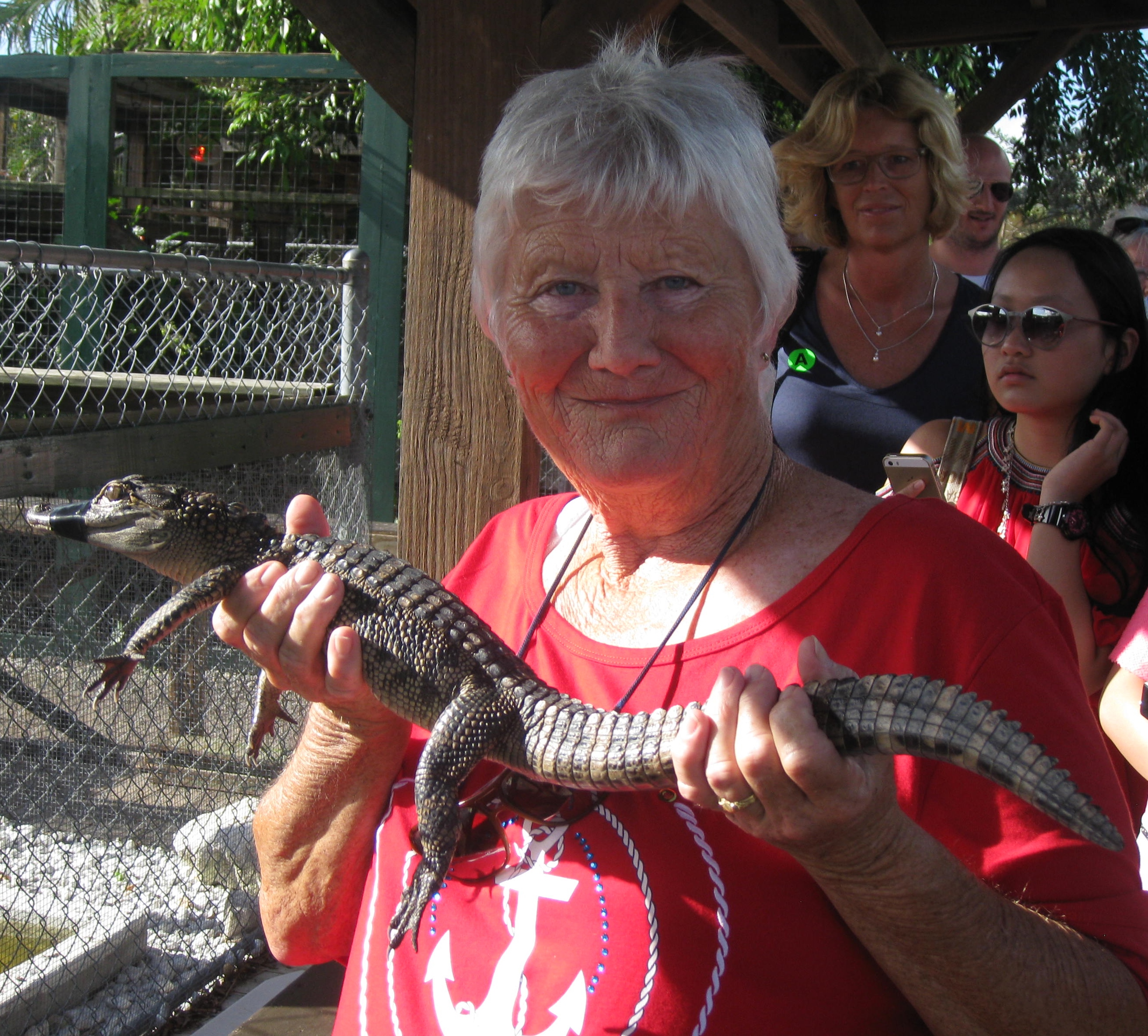 Susan held a baby alligator.